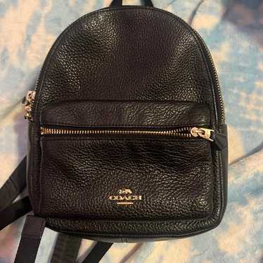black pebble coach mini backpack
