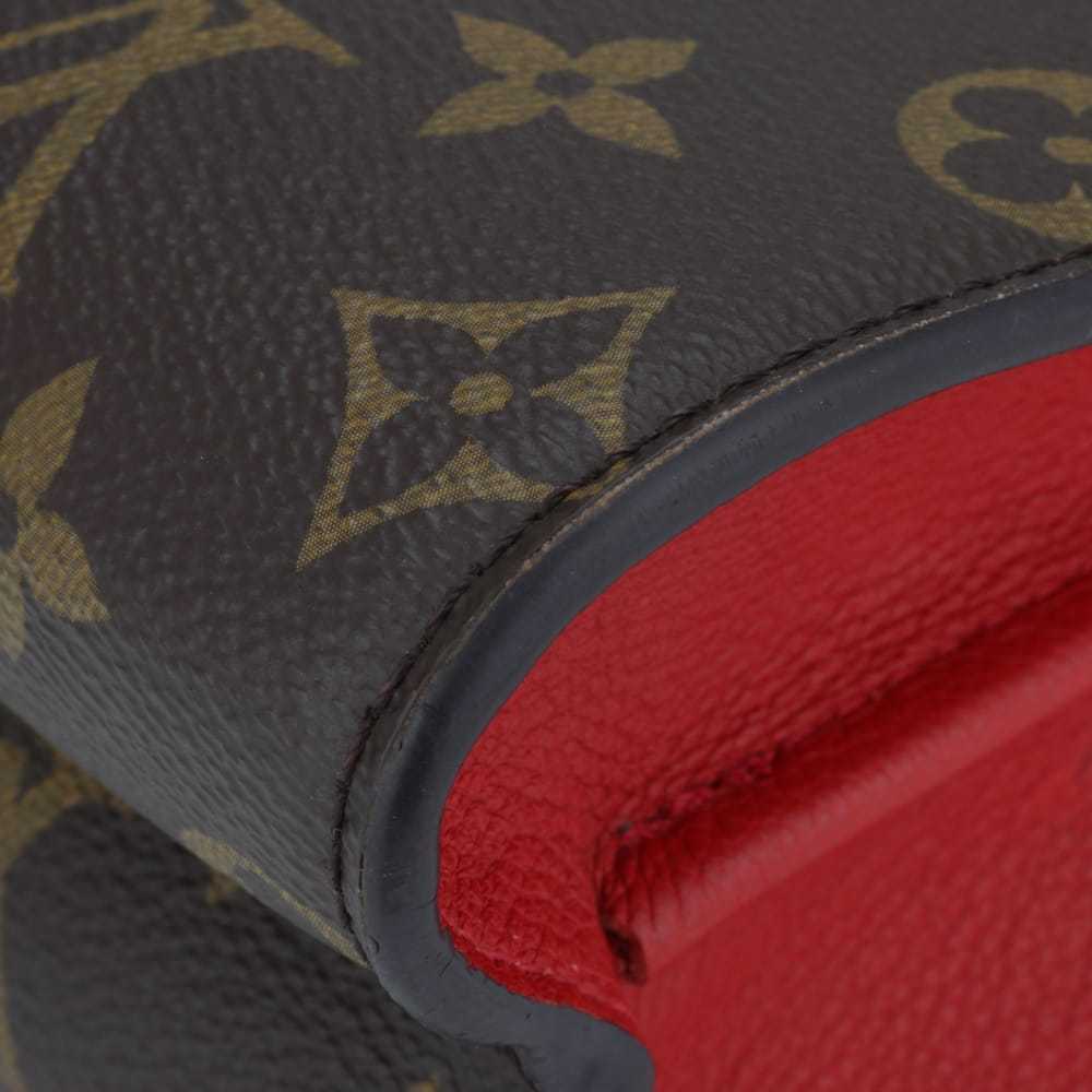 Louis Vuitton Victoire leather handbag - image 11