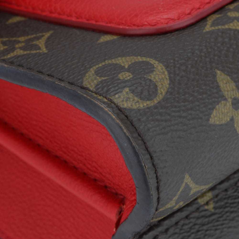 Louis Vuitton Victoire leather handbag - image 8