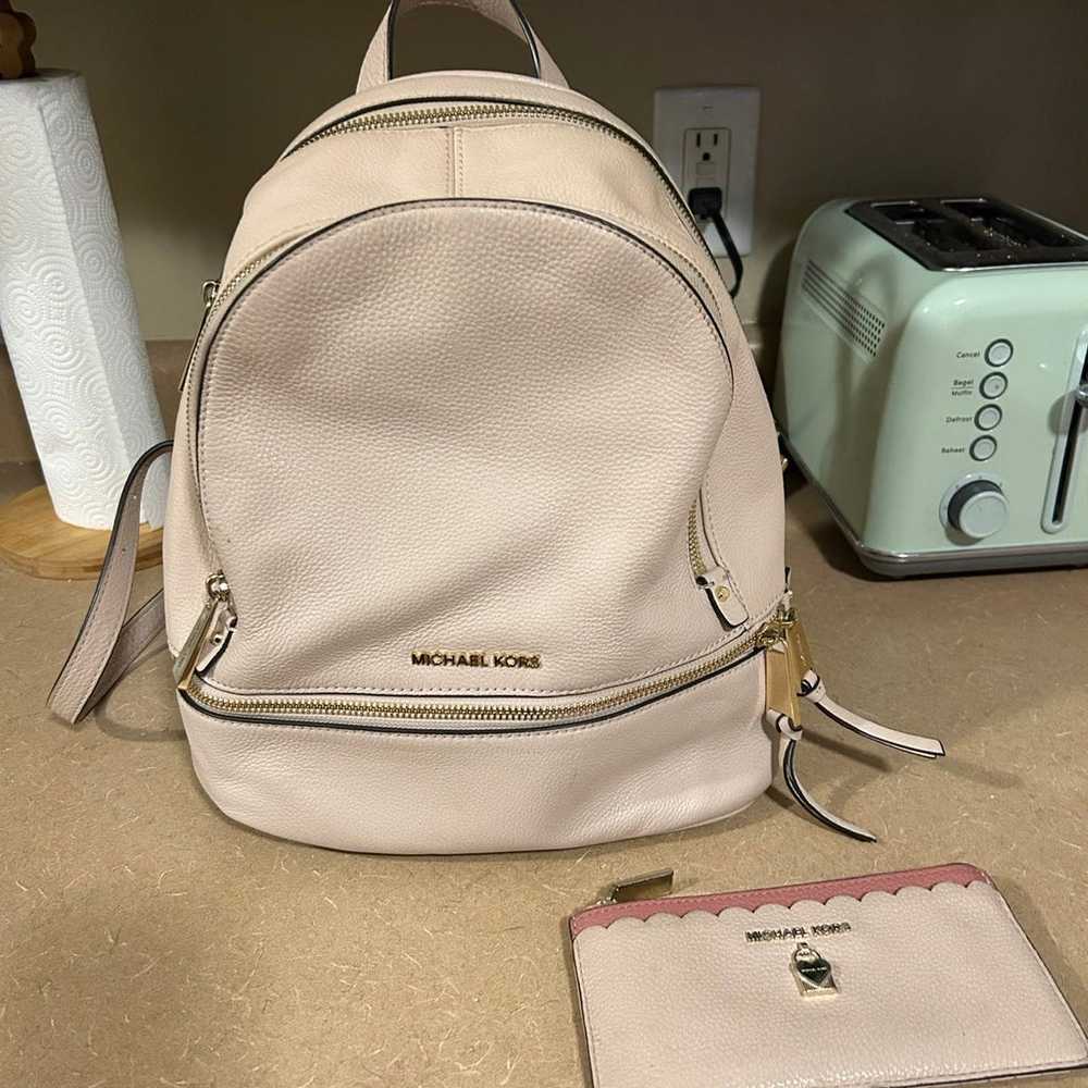 Micheal Kors backpack and wallet - image 1