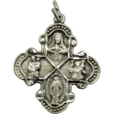 Mid century sterling silver four way Catholic cros