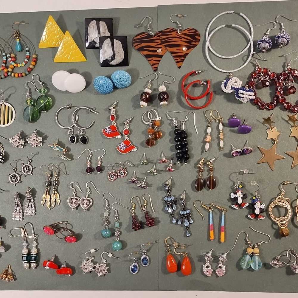 53 pairs of pierced earrings - image 1