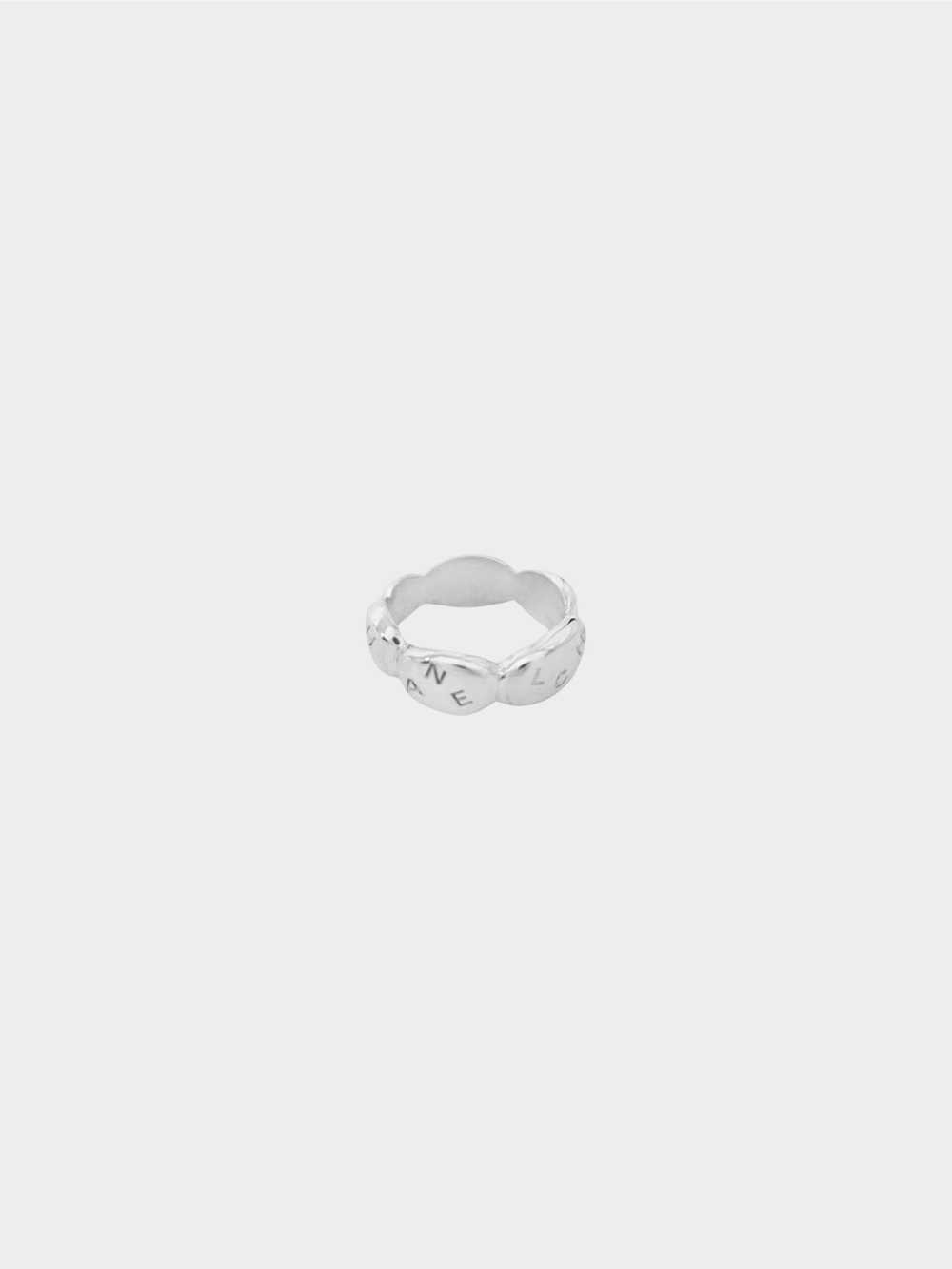 Chanel 1990s Silver Camellia Radis Logo Ring - image 3