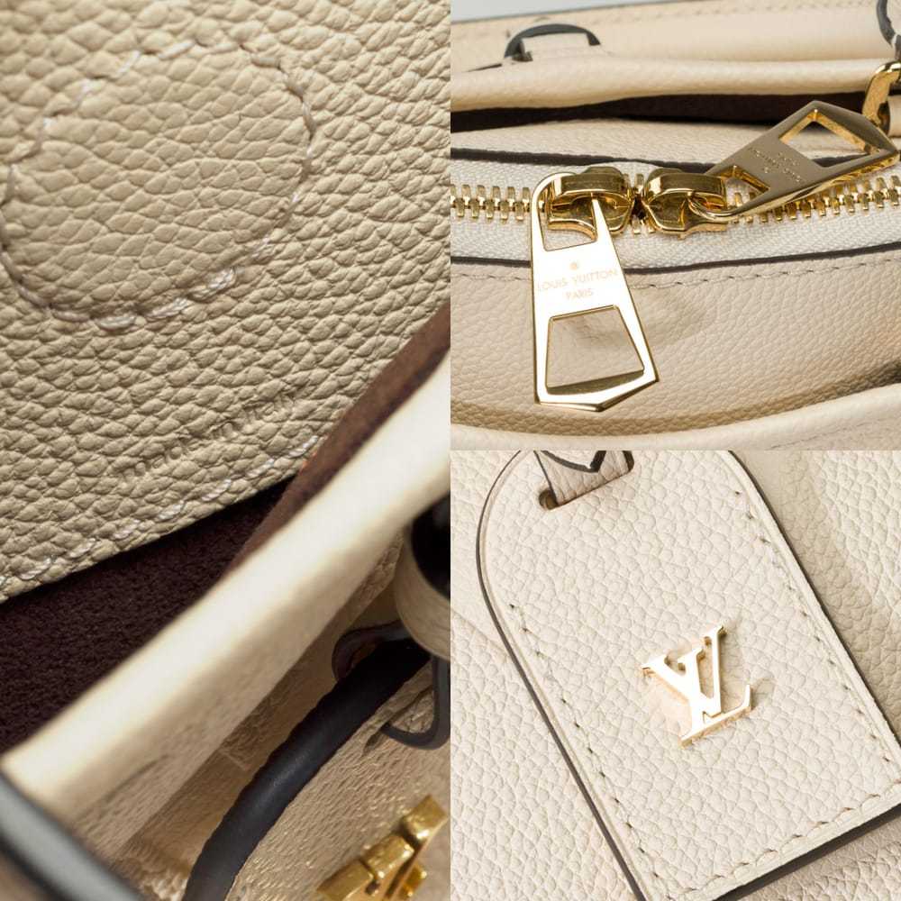 Louis Vuitton Triana leather handbag - image 7