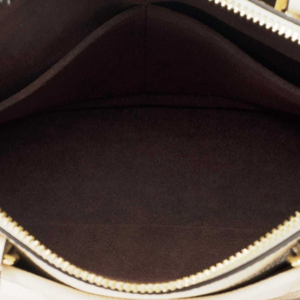 Louis Vuitton Triana leather handbag - image 8