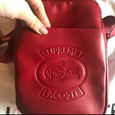 Supreme lacoste deals shoulder bag red