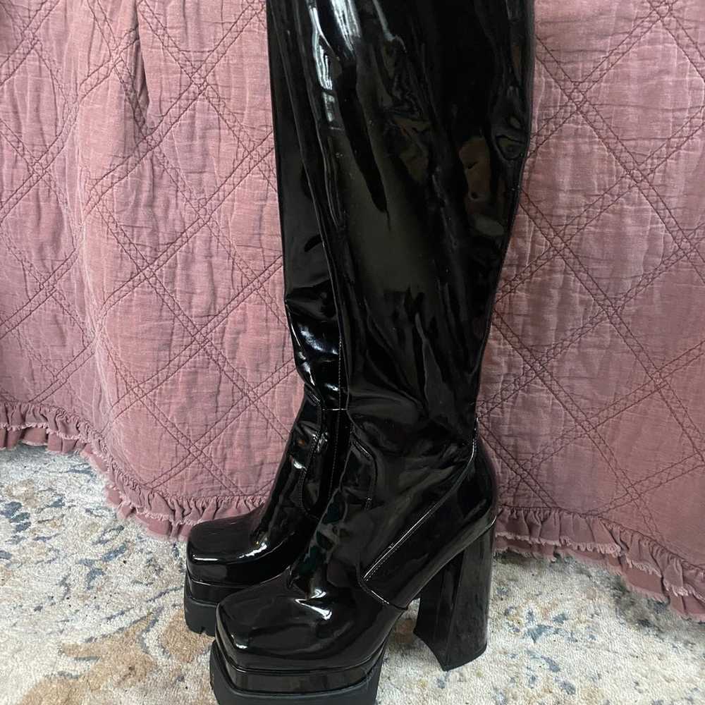 Black platform knee high boots - image 1