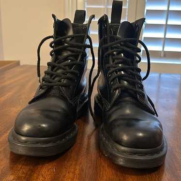 The original  Dr. Martens  black boots.