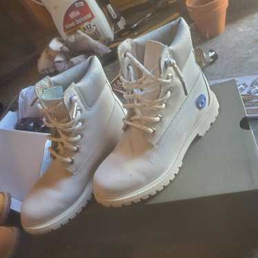 Womens sparkle and blue timbs - image 1