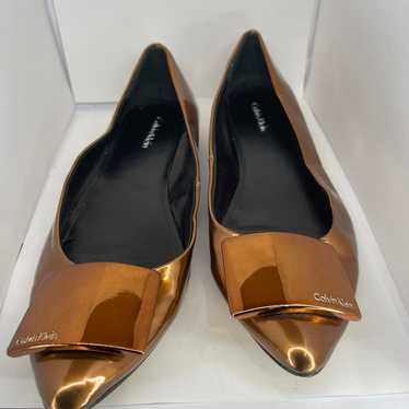 Calvin Klein Gold Metallic Flats.